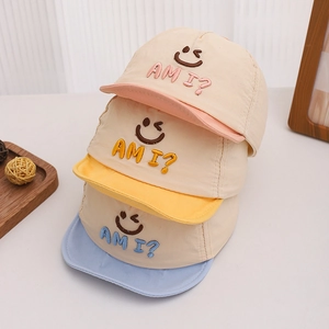 Three-pack toddler soft brim baseball caps with smile embroidery in assorted colors