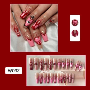 Pink and red coffin press-on nails with flame and heart patterns including 24 pieces