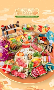 Detailed macro view of a colorful kids kitchen playset featuring hotpot and BBQ toy food