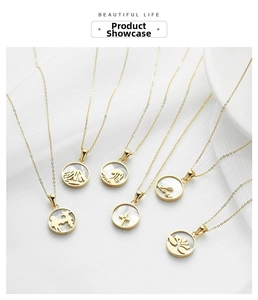 Macro detail of gold necklaces with diverse shell inlays and various hollow-out patterns