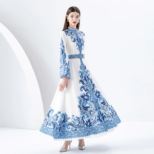 Floral paisley print long dress with high collar and flare sleeves in blue and white