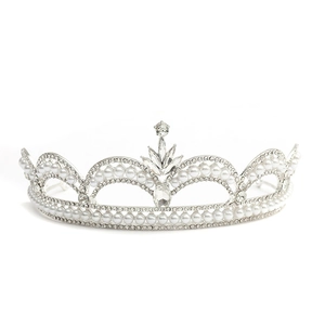 Macro view of silver baroque bridal crown with artificial pearls and water drop crystal