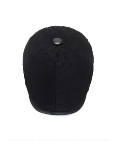 Top view of men's winter flat cap showing premium wool-like textured fabric and top button