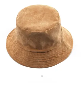 Detail of caramel corduroy bucket hat texture with reinforced brim stitching and fabric