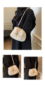 Detail of plush faux fur bucket bag in beige with slim shoulder strap and metal hardware