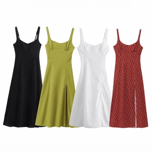 Linen midi sundress with side slit in black, green, white and red polka dot