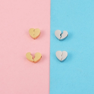 Interlocking heart-shaped stainless steel beads in gold and silver for jewelry making
