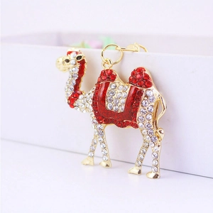 Golden camel keychain with sparkling clear and red rhinestones for bags and keys