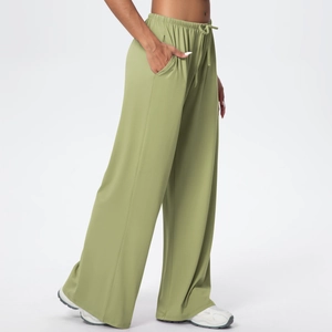 Detail view of olive green high-waisted wide-leg sweatpants with drawstring and side pockets