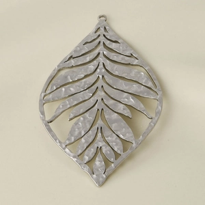 Detail of hollow leaf pendant in 304 stainless steel with hammered texture finish