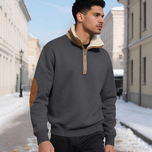 Detail of grey half-zip fleece sweatshirt with sherpa collar and brown elbow patches