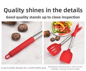 Detail view of long handle red silicone spatula and slotted turner with stainless steel core