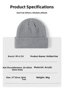 Detail of grey knitted beanie showing ribbed texture, thick acrylic fabric, and 7cm cuff
