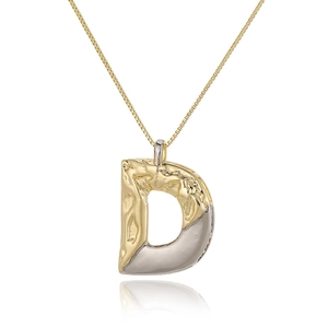 Close-up of dual-tone letter D pendant with hammered gold finish on a box chain