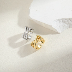 Retro Hong Kong style gold and silver striped adjustable open rings with geometric pattern