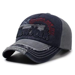 Vintage washed navy and gray baseball cap with New York patch and distressed brim detail