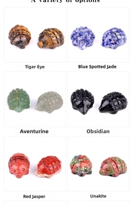 Selection of hand-carved stone hedgehogs in Tiger Eye, Obsidian, and various crystals