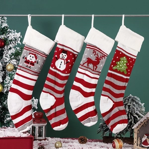 Set of 4 knitted Christmas stockings with Santa, Reindeer, and Snowman patterns
