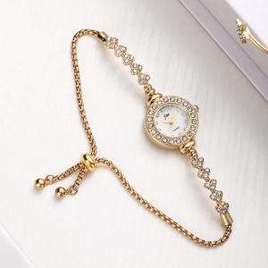 Elegant gold quartz watch bracelet with rhinestones and adjustable heart charm strap