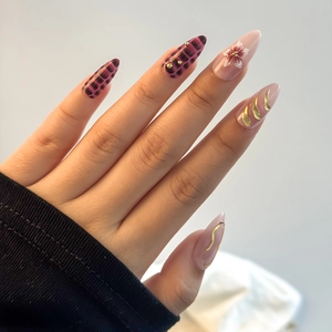 Y2K style crocodile pattern press-on nails with plaid designs and golden 3D metallic details