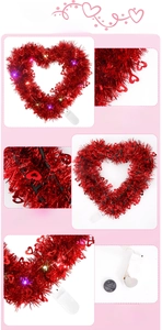 Detail of red heart tinsel wreath with LED lights and battery box for Valentine decor
