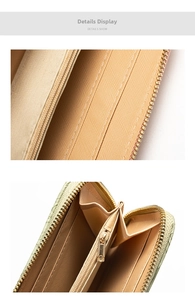 Macro detail of spacious interior with Saffiano leather slots and gold zipper in light green wallet