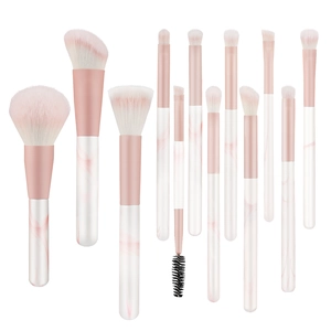 12-piece makeup brush set with white marble handles and pink gradient synthetic bristles