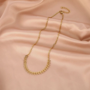 Elegant gold leaf necklace on silk, minimalist laurel wreath design pendant for women