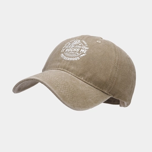 Detail of vintage washed khaki baseball cap with white Motherhood circular logo print