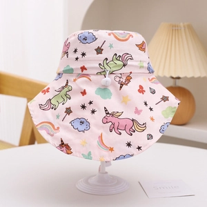 Detail of pink kids bucket hat with unicorn print and adjustable chin strap