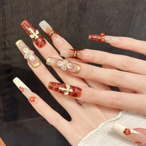 Long coffin press-on nails with leopard print, 3D flowers, and cherry cross charms