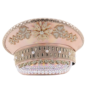 Sparkly champagne gold sequin party hat with rhinestones and center flower detail
