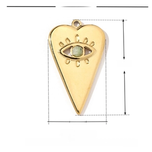 Detail view of heart-shaped gold stainless steel pendant with size 27mm x 16mm