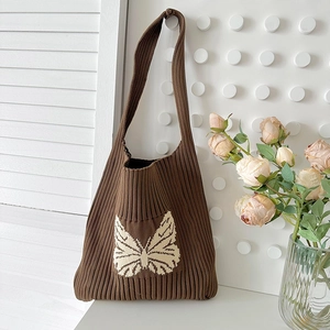 Vintage brown knitted shoulder bag with white butterfly pattern, stylish tote for women