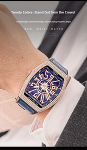 Detail of tonneau quartz watch with diamond bezel and blue leather strap on wrist