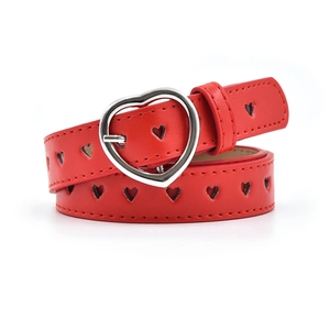 Detail of red PU leather belt with heart-shaped buckle and hollow heart-shaped cutouts