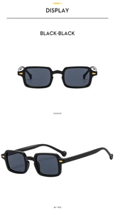 Detail view of retro rectangle sunglasses in black with gold accents and droplet temple tips