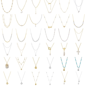 Collection of 36 elegant pearl and 925 sterling silver necklaces with diverse pendants
