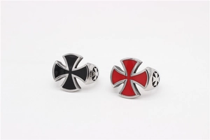 Detail view of gothic crusader cross rings with black and red enamel inlay in steel