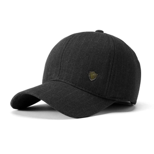 Close-up of the grey baseball cap featuring fine vertical texture and metal emblem