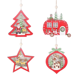 Set of four red wooden LED Christmas ornaments in tree star and camper shapes