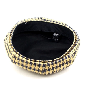 Women's classic houndstooth beret hat in yellow and black pattern with soft inner lining