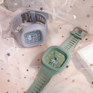 Detail of square silicone watches with cute elephant dial on pink starry mesh fabric