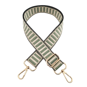 Adjustable green and white striped canvas bag strap with gold metal lobster clasps