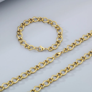 Golden stainless steel chain jewelry set with lobster clasp and textured link design