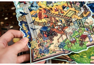 Detail of vintage landscape stickers with intricate irregular die-cut edges and matte finish
