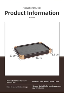 Close-up of walnut wood jewelry tray with gold corners and grey velvet lining 32x23x3.5cm