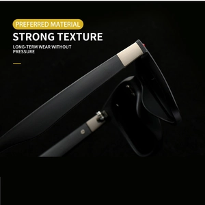Detail of matte black sunglasses with premium brushed metal hinges and strong texture