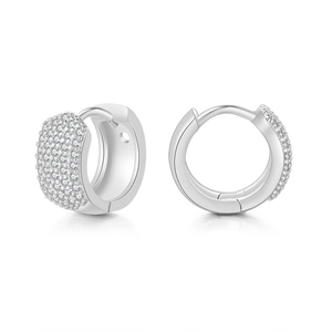 Macro detail of silver pave-set earrings with five rows of sparkling white cubic zirconia