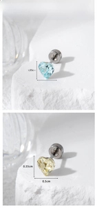 Detailed macro view showing blue and champagne heart crystal studs with screw flat backs